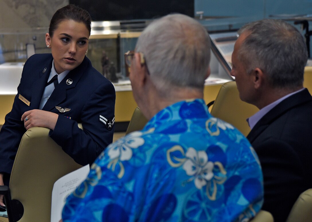 Airman 1st Class Skylar Armstrong, 1st Airlift Squadron flight attendant, talks with other celebration attendees at the Armed Forces Retirement Home in Washington, D.C., Sept. 14, 2018. Joint Base Andrews Airmen joined retirees from the AFRH to celebrate the Air Force’s 71st birthday. (U.S. Air Force photo by Senior Airman Abby L. Richardson)