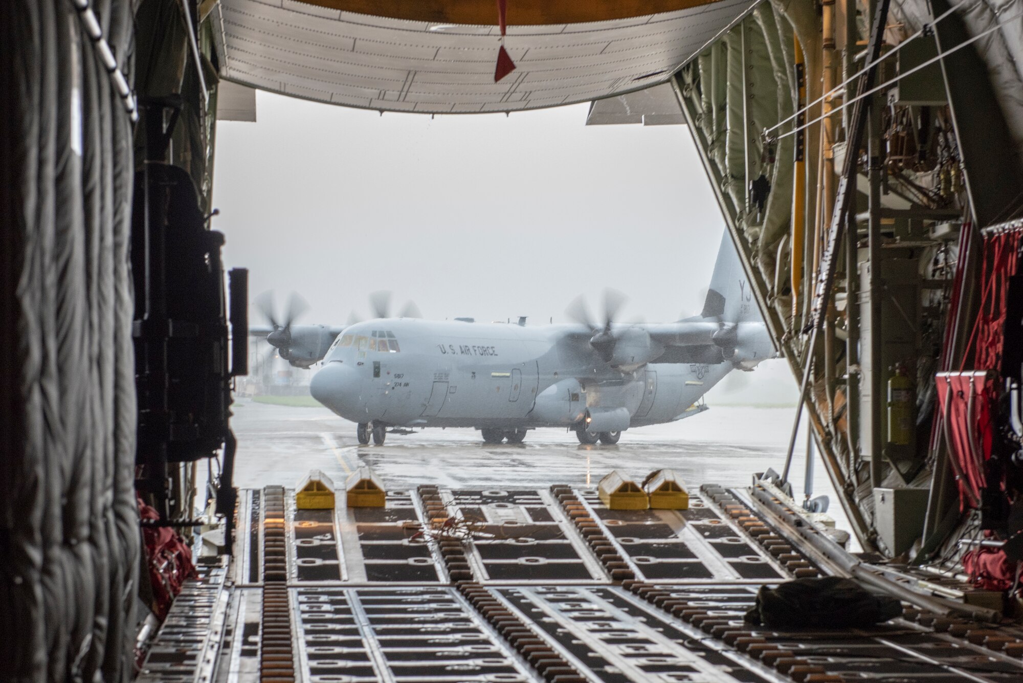 A pair of C-130J Super Hercules taxi back to the flightline after performing a low-cost, low-altitude demonstration at the 2018 Japanese-American Friendship Festival at Yokota Air Base, Japan, Sept. 15, 2018.