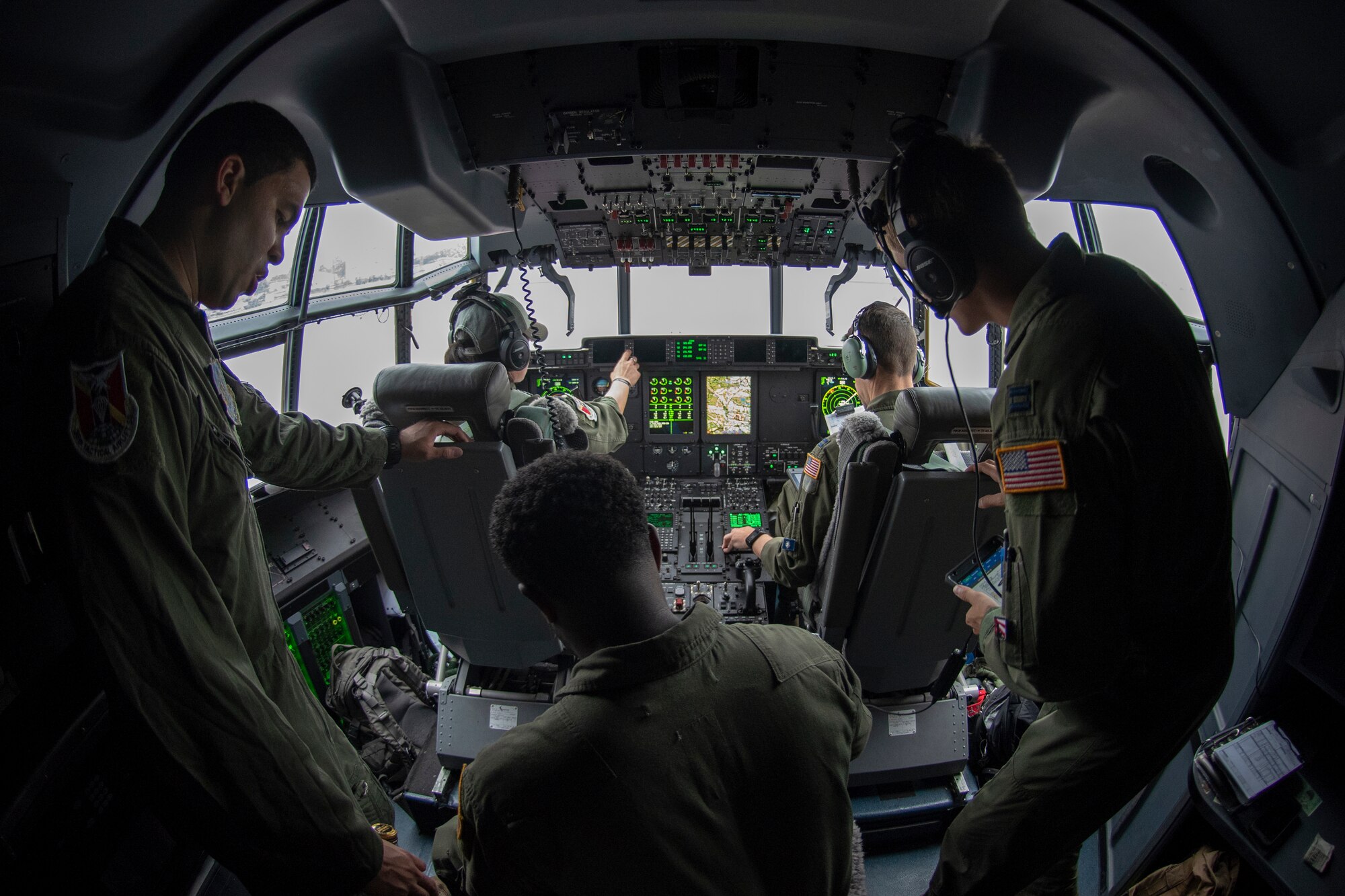 The crew of a C-130J Super Hercules go over a pre-mission briefing prior to performing a low-cost, low-altitude demonstration at the 2018 Japanese-American Friendship Festival at Yokota Air Base, Japan, Sept. 15, 2018.