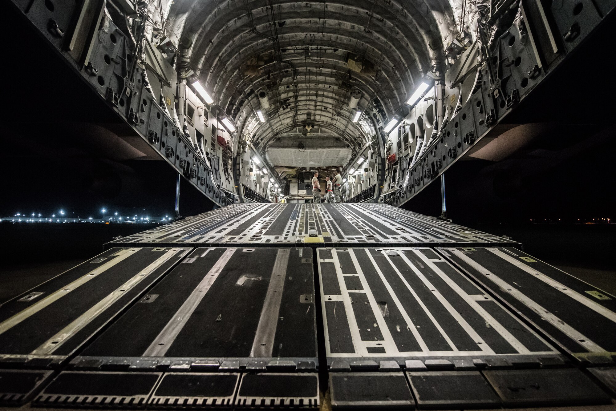 Airmen from the 123rd Airlift Wing load vehicles and cargo onto a C-17 Globemaster III aircraft at the Kentucky Air National Guard Base in Louisville, Ky., Sept. 15, 2018 in response to Tropical Storm Florence. The gear and 10 Airmen from the 123rd Special Tactics Squadron are being deployed to Naval Air Station Oceana in Virginia Beach, Va., to provide stand-alone communications, air traffic control, personnel recovery and paramedic capabilities in response to massive flooding.