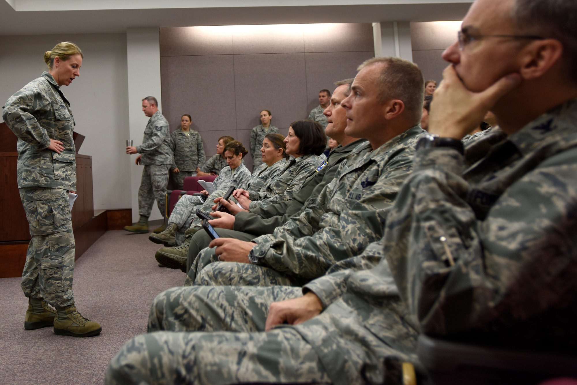 U.S. Air Force Col. Bryony Terrell, commander 145th Airlift Wing, delivers a brief during a meeting held at the North Carolina Air National Guard (NCANG) Base, Charlotte Douglas International Airport, Sept. 14, 2018. Airmen across the base prepare for power outages that may occur as a result of Hurricane Florence. Col. Terrell and other individuals from the NCANG brief on safety, weather updates, and forecasted strategies in the wake of Hurricane Florence.
