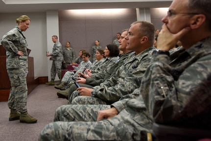 U.S. Air Force Col. Bryony Terrell, commander 145th Airlift Wing, delivers a brief during a meeting held at the North Carolina Air National Guard (NCANG) Base, Charlotte Douglas International Airport, Sept. 14, 2018.