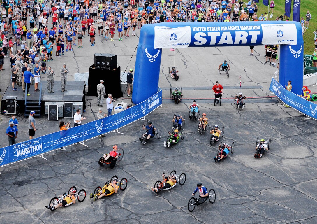 Wheeled participants take off for the 22nd annual Air Force Marathon at Wright-Patterson Air Force base on Sept. 15, 2018.  Over 13,000 runners participated in the 5K, 10K, half and full marathons. (U.S. Air Force photo / Wesley Farnsworth)