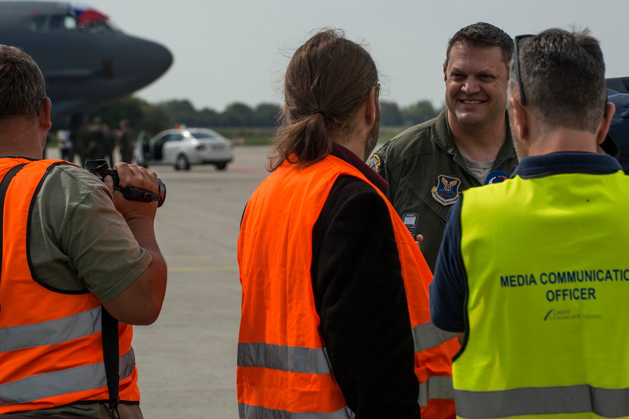 U.S. Air Force Lt. Col. William Fish, 11th Bomb Squadron commander, is interviewed by local media after arriving at the Ostrava Airport, Czech Republic, on Sept. 13, 2018, in support of the NATO Days air show. NATO Days consists of the presentation of heavy military hardware, police and rescue equipment, dynamic displays of Special Forces training, flying displays, and presentation of armaments, equipment and military gear. (U.S. Air Force photo by Master Sgt. Greg Steele)