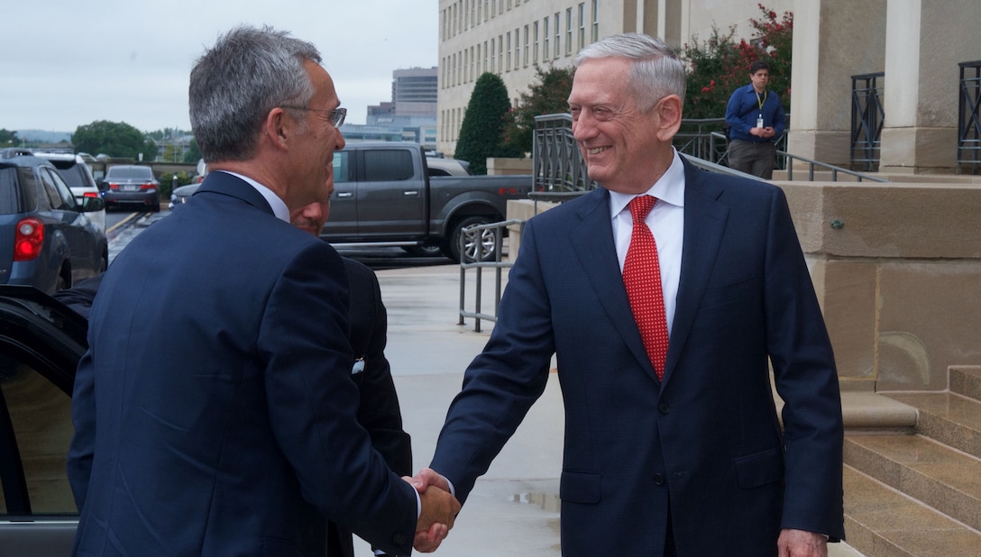 Defense Secretary Jim Mattis greets NATO Secretary General Jens Stoltenberg preceding a Pentagon meeting.