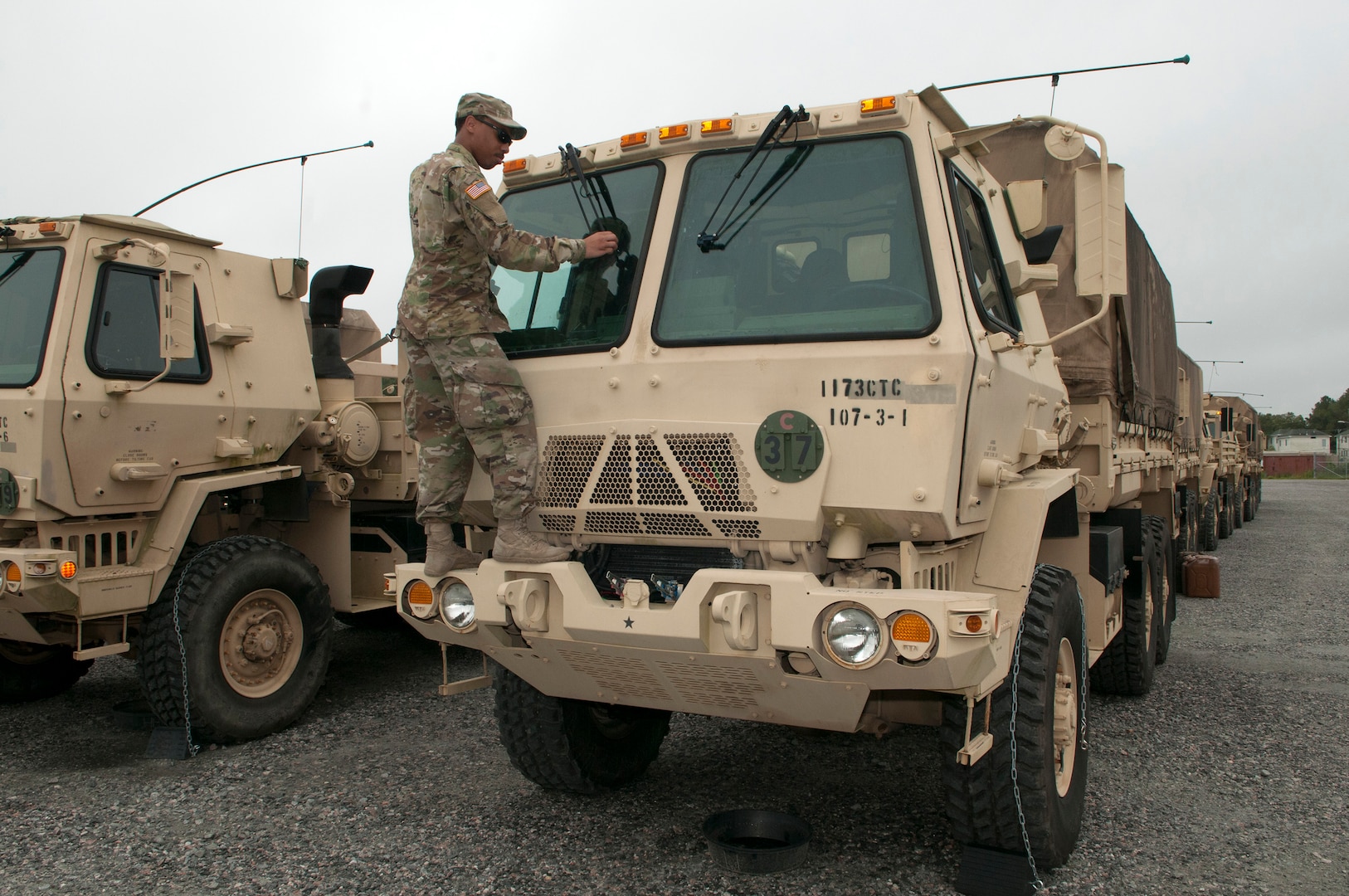 Soldiers assigned to the Virginia National Guard's 1173rd Transportation Company, 529th Combat Sustainment Support Battalion, 329th Regional Support Group assemble six Light Medium Tactical Vehicles with supplies including food, fuel, protectice equipment met and wet weather gear Sept. 13, 2018, at the State Military Reservation in Virginia Beach. The LMTVs deployed to fire stations in Chesapeake, Virginia, to assist with possible hurricane response operations as Hurricane Florence makes landfall.