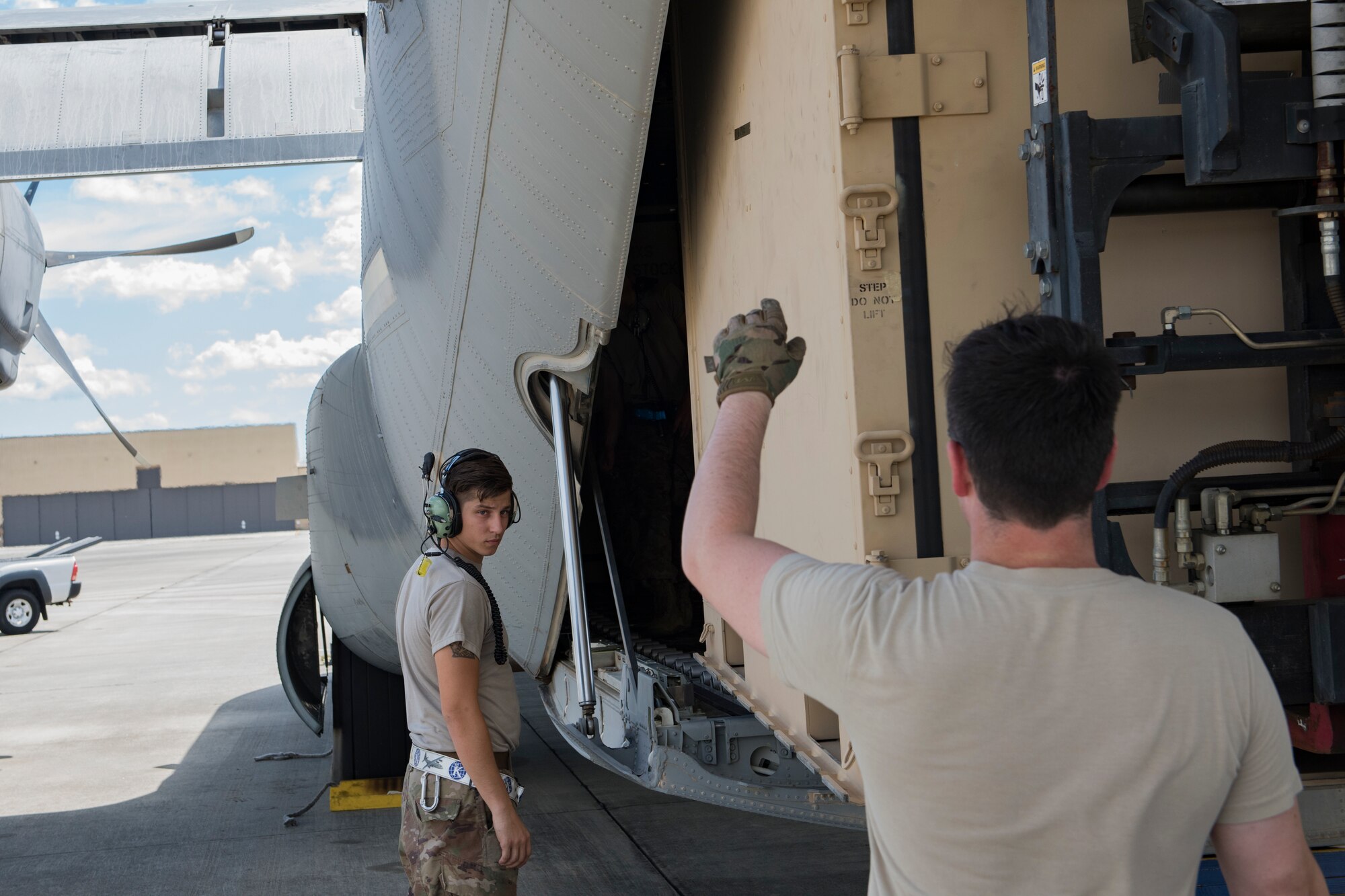 Airmen from the 71st Rescue Squadron and 723d Aircraft Maintenance Squadron load pallets and equipment onto a HC-130 J Combat King II, Sept. 15, 2018, at Moody Air Force Base, Ga. The 334th Air Expeditionary Group launched HC-130J Combat King IIs, HH-60G Pavehawks, aircrew and support personnel to pre-position at Joint Base Charleston, S.C., for potential Tropical Storm Florence response. Under the command of Col. John Creel, the 374th Rescue Group commander, the AEG integrated to make one expeditionary search and rescue unit comprised of rescue and support personnel from both the 23d Wing, 920th Rescue Wing at Patrick Air Force Base, Fla., and 51st Communications Squadron at Warner Robins Air Force Base, Ga.  (U.S. Air Force photo by Staff Sgt. Eric Summers Jr.)