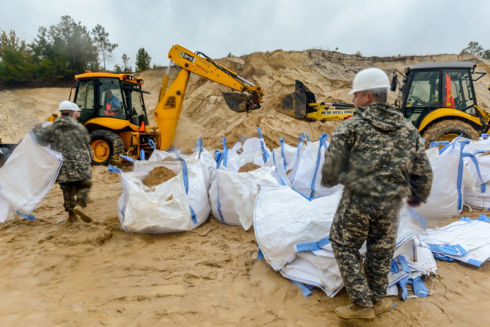 South Carolina National Guard Soldiers and S.C. Department of Transportation fill sandbags in preparation of possible flooding caused by Tropical Storm Florence, September 15, 2018.