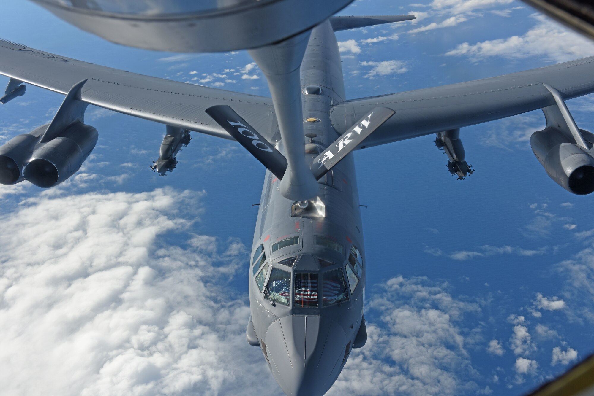 A U.S. Air Force B-52 Stratofortress receives fuel from a U.S. Air Force KC-135 Stratotanker during an air-refueling mission off the coast of Norway, Sept. 15, 2018. The purpose of the flight was to conduct theater familiarization for aircrew members and to demonstrate U.S. commitment to allies and partners through the global employment of our military forces. (U.S. Air Force photo by Senior Airman Luke Milano)