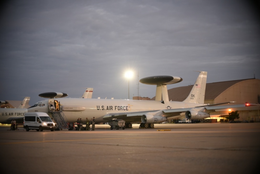 An E-3G Airborne Warning and Control System aircraft of the 552nd Air Control Wing, 960th Airborne Air Control Squadron, is prepared during the early morning hours of Sept. 15, 2018 for a response to Hurricane Florence mission at Tinker Air Force Base, Oklahoma. The AWACS will provide air control and de-confliction service along the East Coast of the United States as they monitor and control airspace as local, state and federal assets move in to the area to conduct rescue and recovery operations. (U.S. Air Force photo/Greg L. Davis)