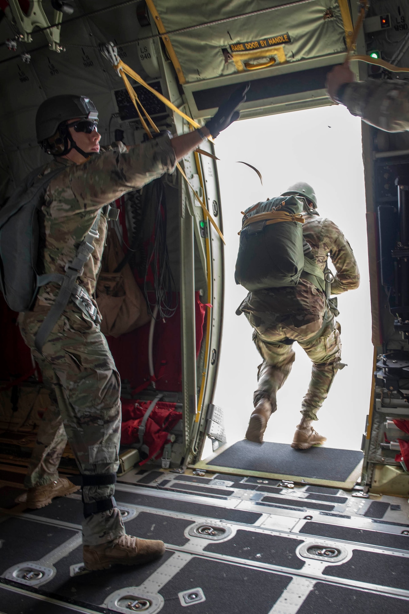 Operators from the U.S. Army 1st Special Forces Group leap from a C-130J Super Hercules as part of a static line jump demonstration at the 2018 Japanese-American Friendship Festival at Yokota Air Base, Japan, Sept. 16, 2018.