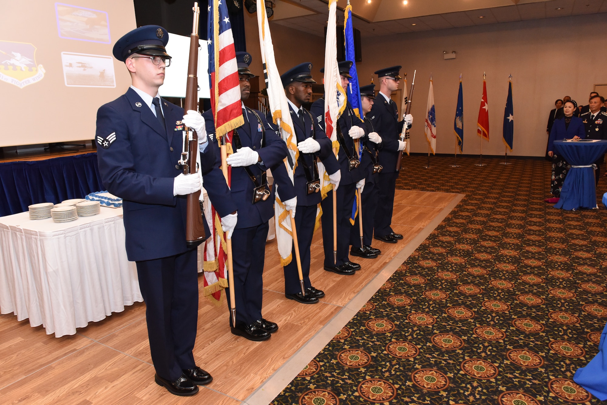 A U.S. Air Force honor guard presents the colors during the American and Republic of Korea national anthems at an Air Force 71st Birthday Ball at Osan Air Base, Republic of Korea, September 15, 2018.