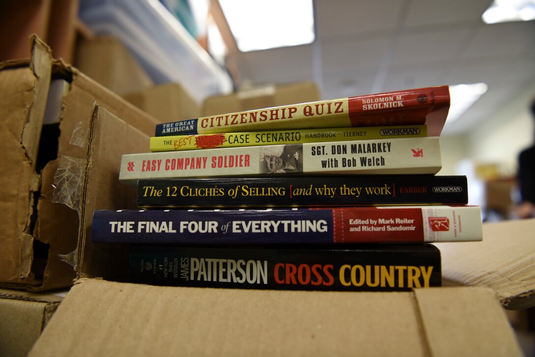 Library books donated by Kunsan’s Rosenblum Memorial Library during a base wide Back to School Drive awaits packing at Kunsan Air Base, Republic of Korea, Sept. 13, 2018. The library donated more than 400 books and Airmen from across the base donated over 5,000 dollars in school supplies for local schools. (U.S. Air Force photo by Senior Airman Savannah L. Waters)