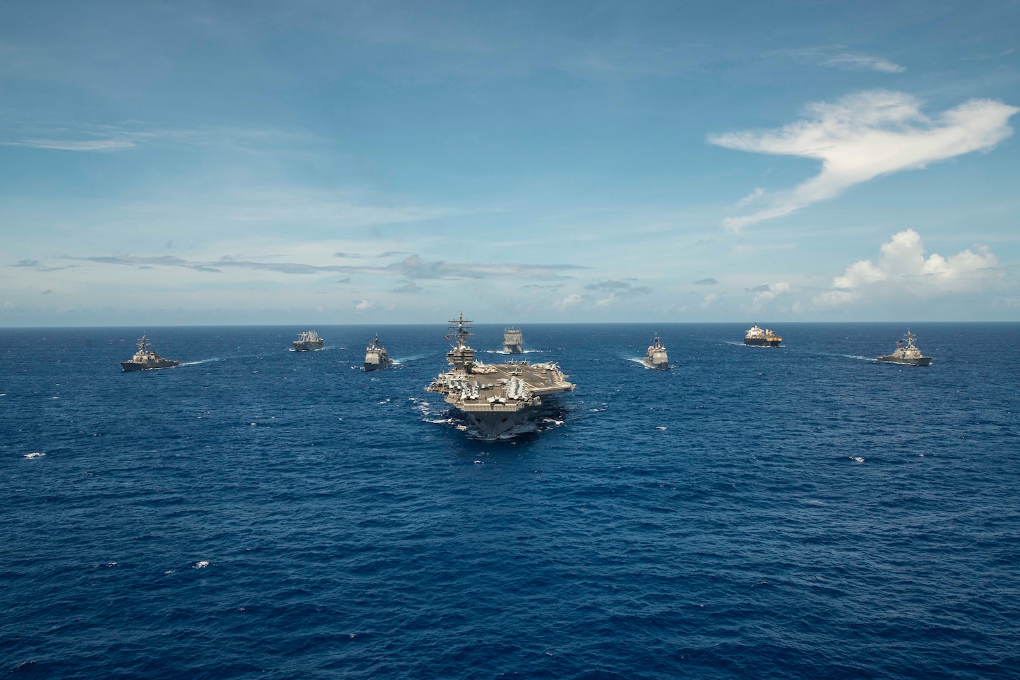 PHILIPPINE SEA (Sept. 17, 2018) The aircraft carrier USS Ronald Reagan (CVN 76) leads the Ronald Reagan Strike group, including the Ticonderoga-class missile cruisers USS Antietam (CG 54) and USS Chancellorsville (CG 62) and the Arleigh Burke-class guided-missile destroyers USS Benfold (DDG 65) and USS Milius (DDG 69), during exercise Valiant Shield 2018.