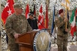Distinguished visitors render courtesies during the Combined Joint Task Force – Operation Inherent Resolve transfer of authority ceremony in Baghdad,  Sept. 13, 2018.  The U.S. Army’s III Armored Corps, deployed from Fort Hood, Texas, to areas in Southwest Asia, transferred its command authority to the XVIII Airborne Corps, deployed from Fort Bragg, North Carolina.  CJTF-OIR is a 79-member global coalition, which works by, with, and through partner forces to defeat ISIS in designated areas of Iraq and Syria, and sets conditions for follow-on operations to increase regional stability.