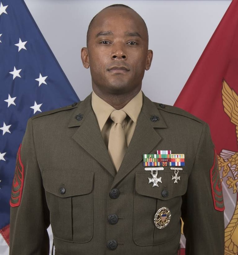 First Sergeant Robert E. Catching, First Sgt.  for Marine Security Forces Company, Guantanamo Bay Cuba.