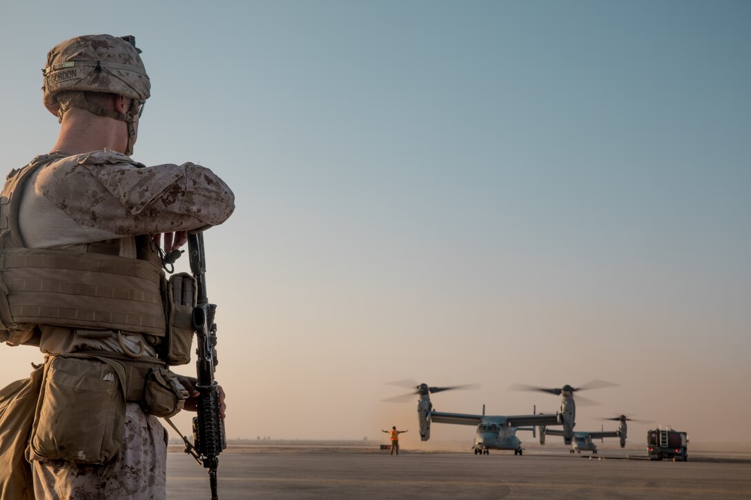 A U.S. Marine with 3rd Battalion, 7th Marine Regiment, attached to Special Purpose Marine Air-Ground Task Force, Crisis Response-Central Command, prepares to board an MV-22 Osprey on his way to a site near At-Tanf Garrison, Syria, Sept. 7, 2018. SPMAGTF-CR-CC Marines supported Special Operations Joint Task Force – Operation Inherent Resolve, conducting live-fire demonstrations showcasing the unit’s crisis response capabilities.