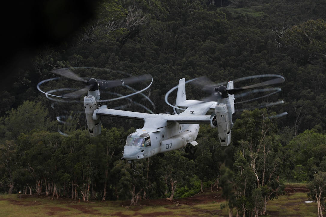 An MV-22 Osprey aircraft assigned to Marine Medium Tiltrotor Squadron 363, takes off during a confined area landing exercise near the Kahuku Training Area, Sept. 13, 2018. The training provided an opportunity for pilots and crew chiefs to improve their proficiency and experience in flying around a tropical environment.