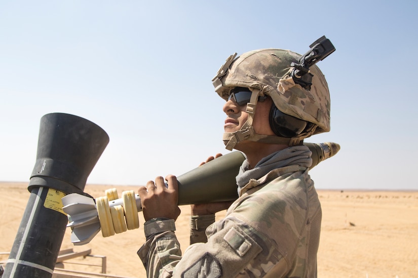 U.S Army Spc. Jose Amador, an assistant gunner, assigned to Alpha Company, 1st Battalion, 155th Infantry Regiment, 155th Armored Brigade Combat Team, Task Force Spartan, waits for the order to “hang” a mortar during a combined live-fire exercise near Alexandria, Egypt, Sept. 11, 2018.  The 155th ABCT is in the Arab Republic of Egypt taking part in Exercise Bright Star 18, a multilateral U.S. Central Command training exercise. Bright Star 18 focuses on continuously improving interoperability throughout the full range of military operations between the U.S. military and Egyptian armed forces.