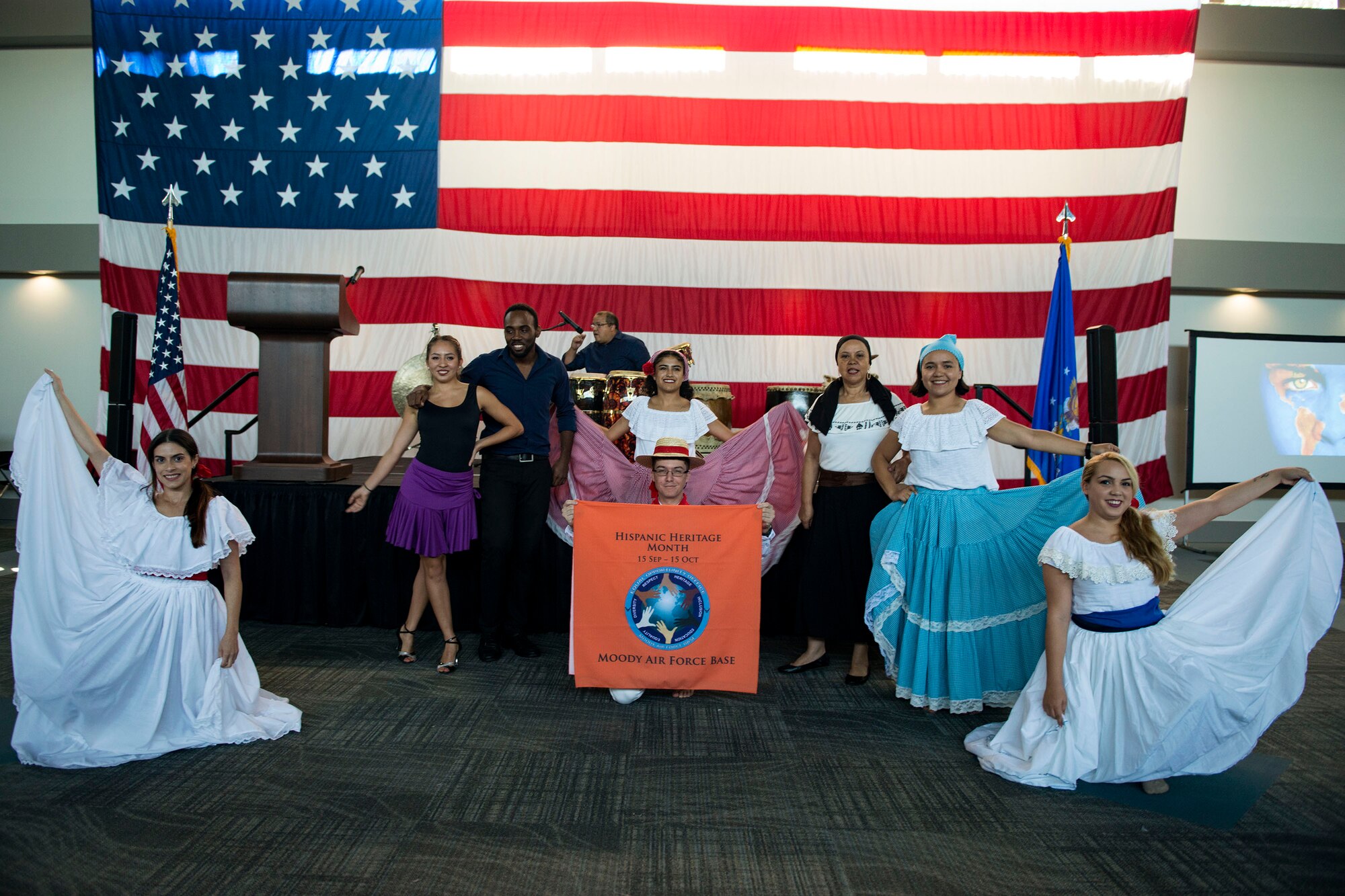 Performers pose for a photo during the 23d Wing Diversity Day, Sept. 14, 2018, at Moody Air Force Base, Ga. Diversity Day honored the cultures of all groups and organizations observed by the Department of Defense using forms of expression such as poems and native dances. The theme of this year was ’Many Cultures, One Voice: Stronger Through Inclusion And Equality’. (U.S. Air Force photo by Airman 1st Class Erick Requadt)