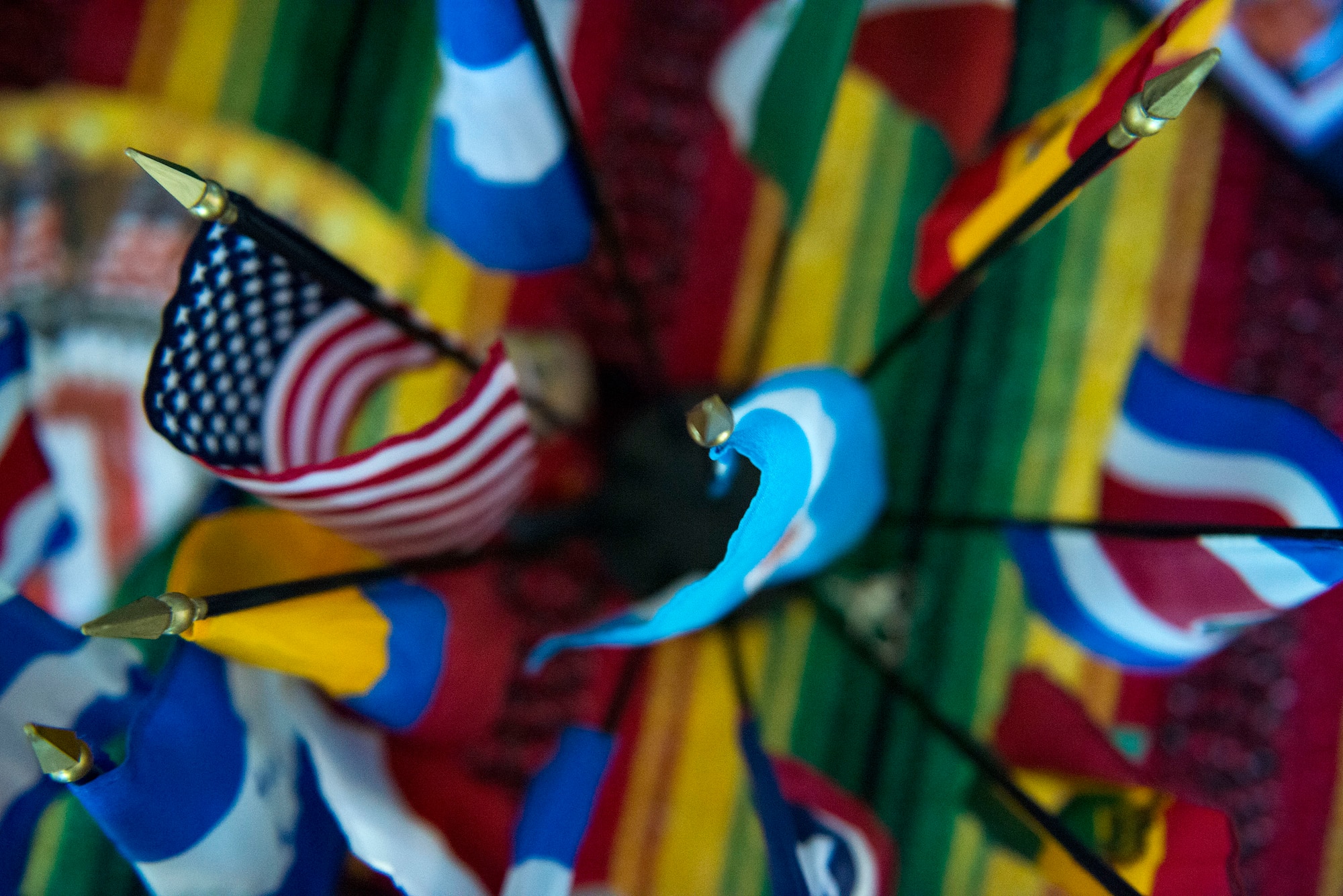 Flags rest on display during the 23d Wing Diversity Day, Sept. 14, 2018, at Moody Air Force Base, Ga. Diversity Day honored the cultures of all groups and organizations observed by the Department of Defense using forms of expression such as poems and native dances. The theme of this year was ’Many Cultures, One Voice: Stronger Through Inclusion And Equality’. (U.S. Air Force photo by Airman 1st Class Erick Requadt)