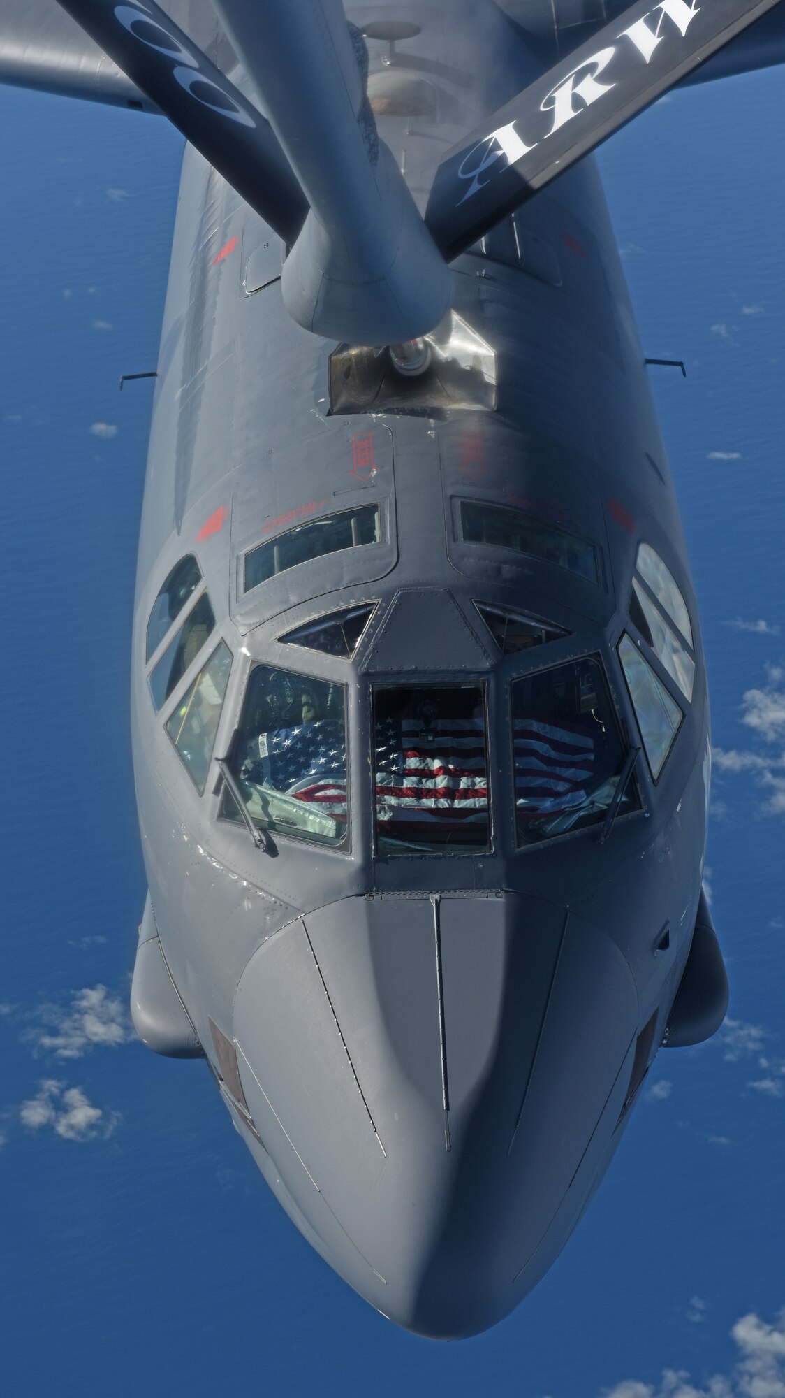 A U.S. Air Force B-52 Stratofortress receives fuel from a U.S. Air Force KC-135 Stratotanker during an air-refueling mission off the coast of Norway, Sept. 15, 2018. The purpose of the flight was to conduct theater familiarization for aircrew members and to demonstrate U.S. commitment to allies and partners through the global employment of our military forces. (U.S. Air Force photo by Senior Airman Luke Milano)