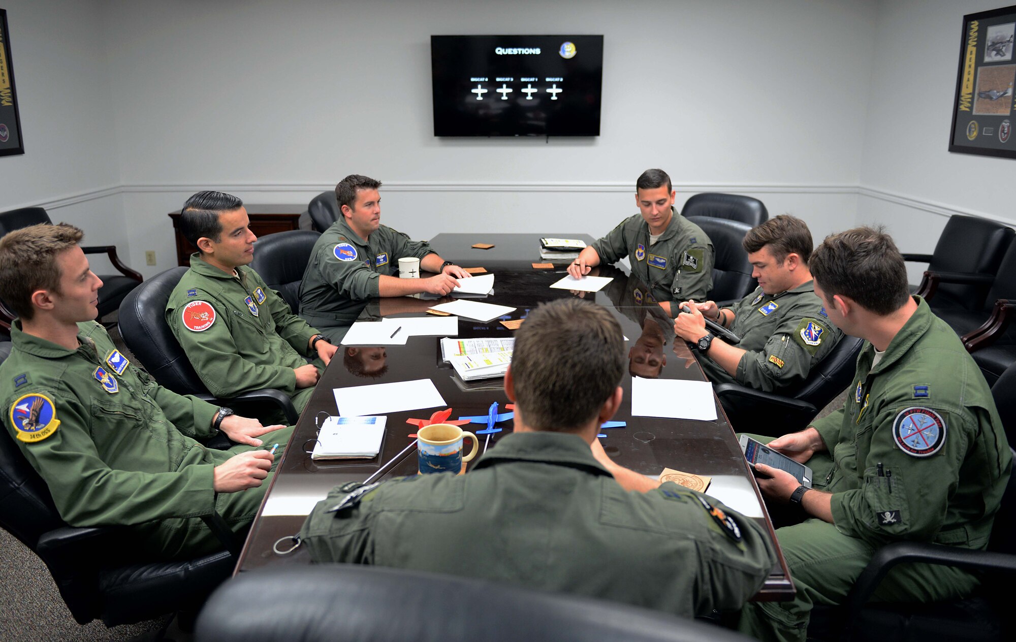 Instructor pilots assigned to the 37th Flying Training Squadron prepare for an upcoming flyover Sept. 4, 2018, on Columbus Air Force Base, Mississippi. Four T-6 Texan IIs flew over the Notre Dame Stadium before the kickoff of the Notre Dame versus Ball State football game in South Bend, Indiana, Sept. 8. (U.S. Air Force photo by Senior Airman Vincent Espinoza)