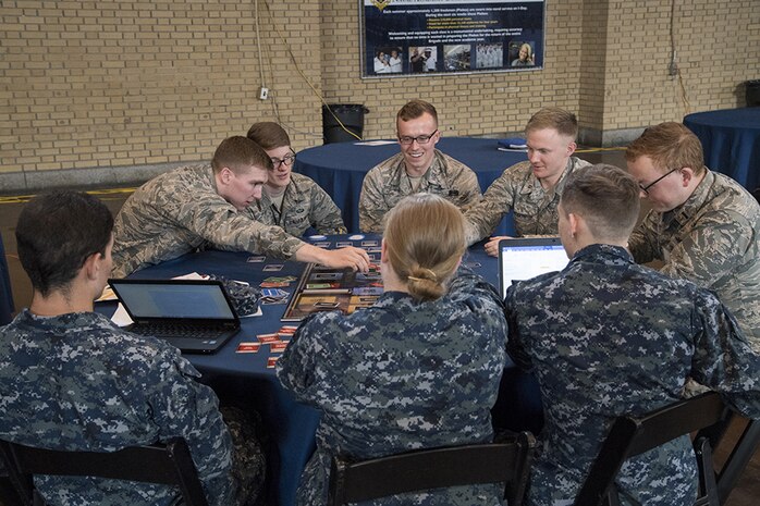 NCX participants work together around a table