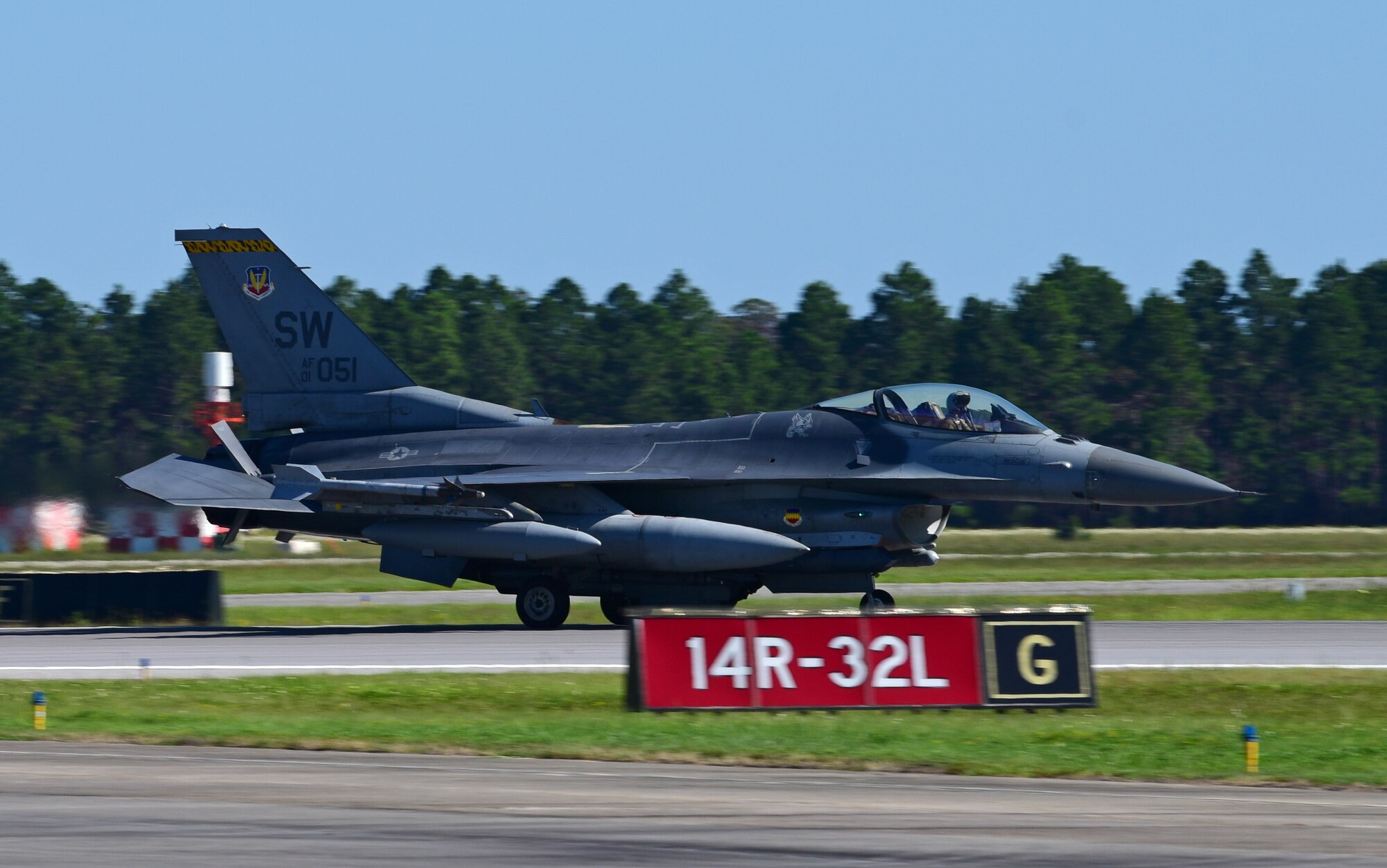 A U.S. Air Force F-16 Fighting Falcon from the 20th Fighter Wing, Shaw Air Force Base, S.C., lands at Tyndall Air Force Base, Fla., Sept. 12, 2018. Shaw sent a number of its assets to Tyndall to escape the path of Hurricane Florence. (U.S. Air Force photo by Senior Airman Isaiah J. Soliz)