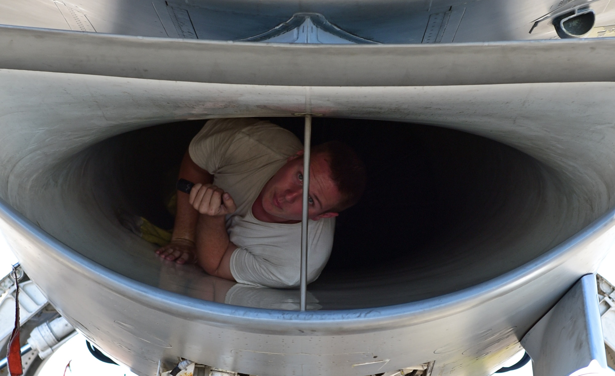 An Airman from the 20th Fighter Wing, Shaw Air Force Base, S.C., conducts a post-flight inspection on an F-16 Fighting Falcon at Tyndall Air Force Base, Fla., Sept. 12, 2018. Shaw’s 77th and 79th Fighter Squadron sent a number of its assets to Tyndall to escape the path of Hurricane Florence. (U.S. Air Force photo by Senior Airman Isaiah J. Soliz)