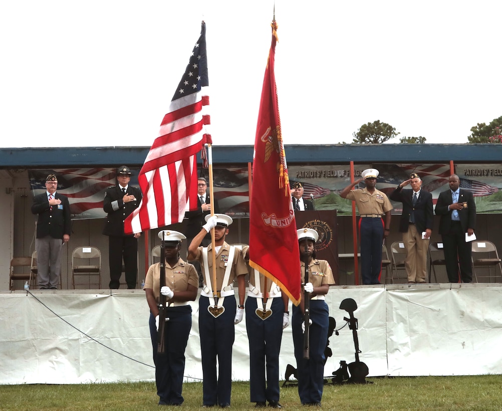Marine Corps Logistics Base Albany Commanding Officer Col. Alphonso Trimble joined other dignitaries to honor those who paid the ultimate price on September 11, 2001 during the annual Field of Flags remembrance ceremony held by the American Legion Post 30. Trimble and guest speaker, John Tibbits, were in the Pentagon on the day of the terror attacks. (U.S. Marine Corps photo by Re-Essa Buckels).