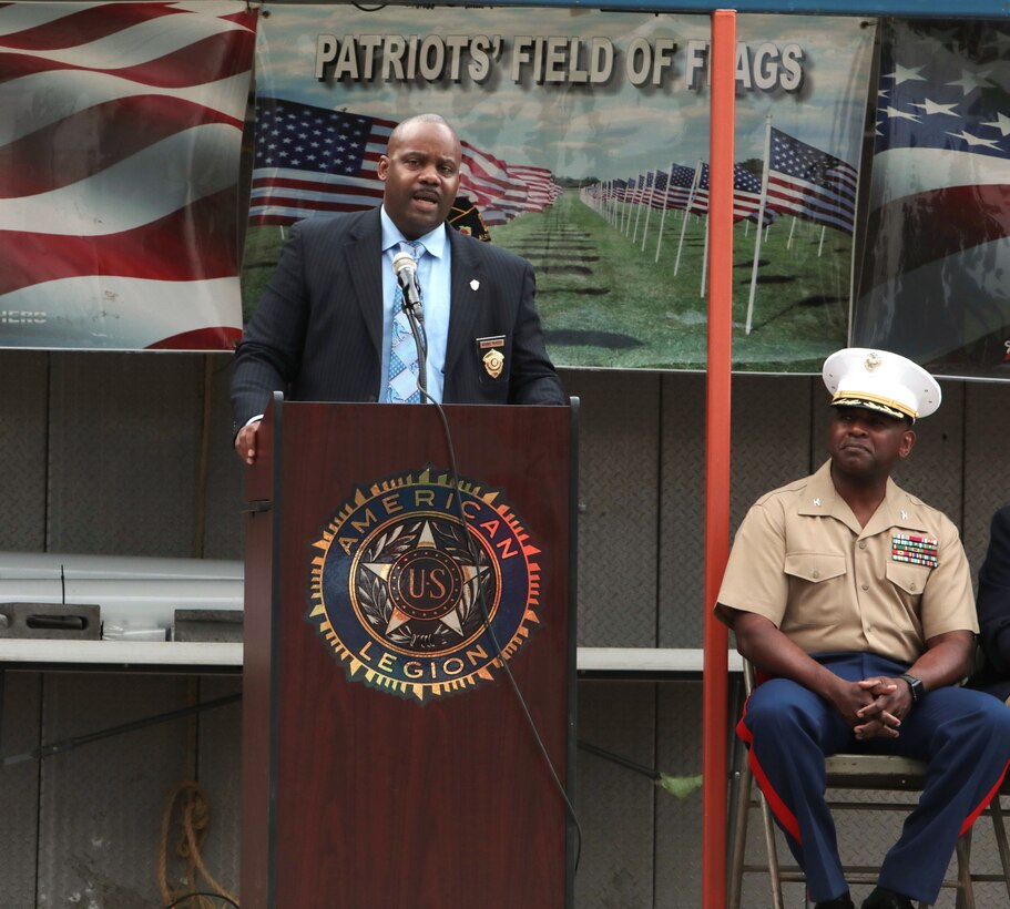 Marine Corps Logistics Base Albany Commanding Officer Col. Alphonso Trimble joined other dignitaries to honor those who paid the ultimate price on September 11, 2001 during the annual Field of Flags remembrance ceremony held by the American Legion Post 30. Trimble and guest speaker, John Tibbits, were in the Pentagon on the day of the terror attacks. (U.S. Marine Corps photo by Re-Essa Buckels).