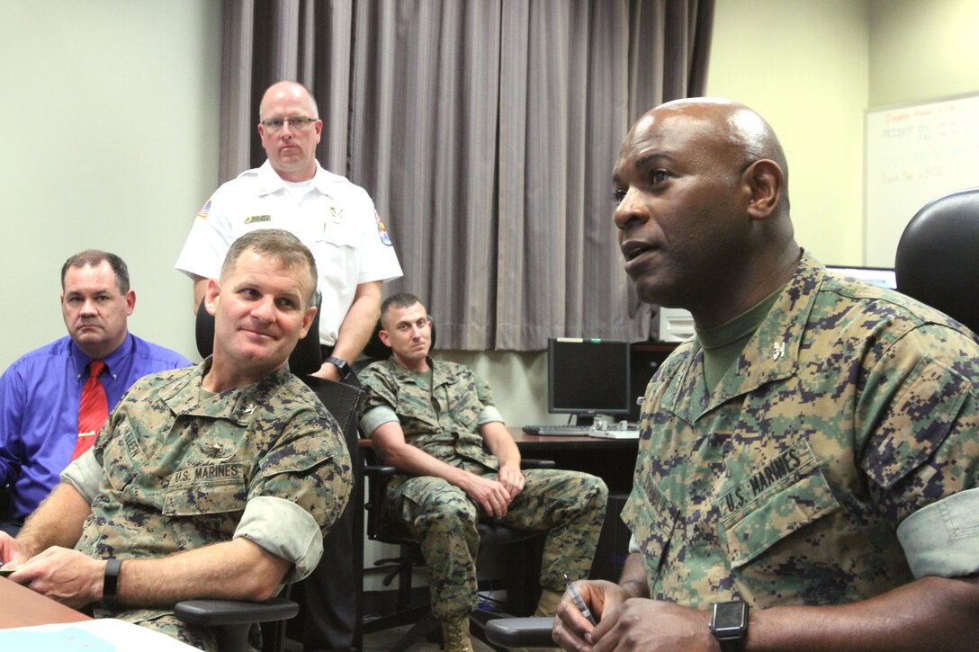 Marine Corps Logistics Base Albany officials are preparing to house recruits and permanent personnel from Marine Corps Recruit Depot Island, S.C., due to Hurricane Florence's potential landfall this week. MCLB Albany's Commanding Officer Col. Alphonso Trimble and MCRD Parris Island, Headquarters and Service Battalion, Commanding Officer Col. Sean Killeen are closely monitoring the events of the storm at MCLB Albany's Emergency Operations Center. (U.S. Marine Corps photo by Re-Essa Buckels).