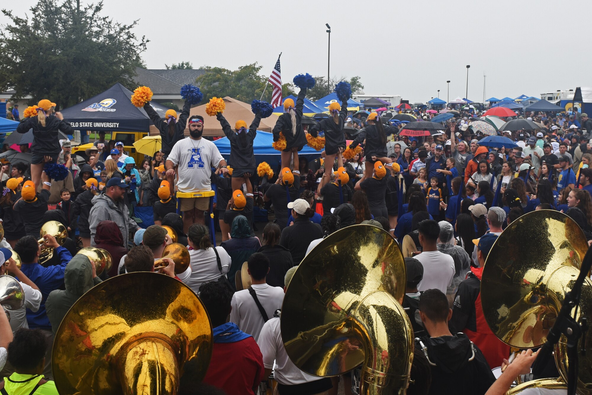 The Ram Band wrapped up the Ram Jam segment of Military Appreciation Day before marching over to the LeGrand stadium, in San Angelo, Texas, Sept. 15, 2018. During the Ram Jam, there were booths open for individuals interested in learning about local organizations as well as Angelo State University and the ROTC program. (U.S. Air Force photo by Airman 1st Class Zachary Chapman/Released)