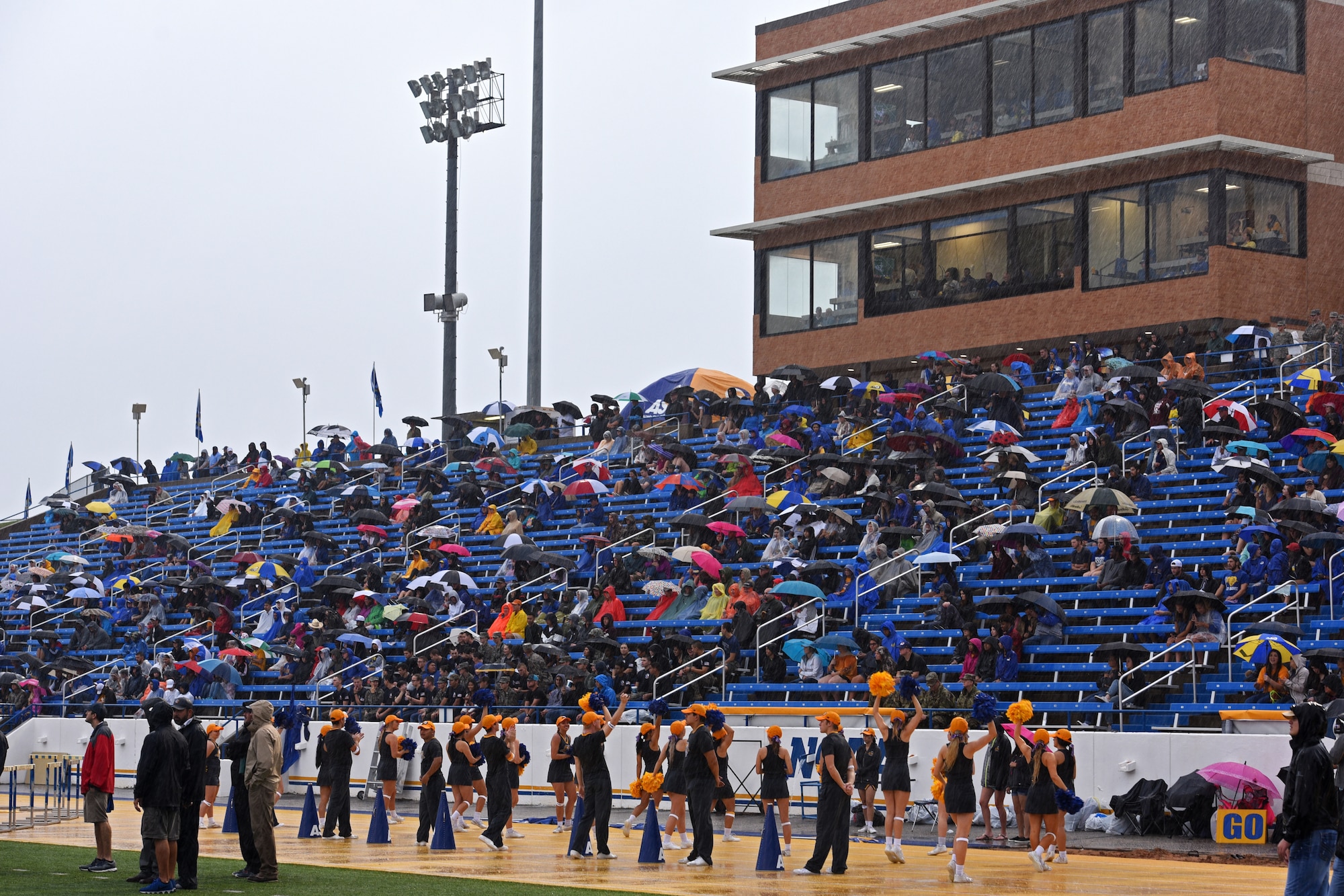 More than 1,500 attendees watch the Angelo State University play against Texas A&M Kingsville during the Military Appreciation Day at the LeGrand stadium, in San Angelo, Texas, Sept. 15, 2018. Despite the constant rain, members from both Goodfellow and San Angelo came out to show support and appreciation. (U.S. Air Force photo by Airman 1st Class Zachary Chapman/Released)