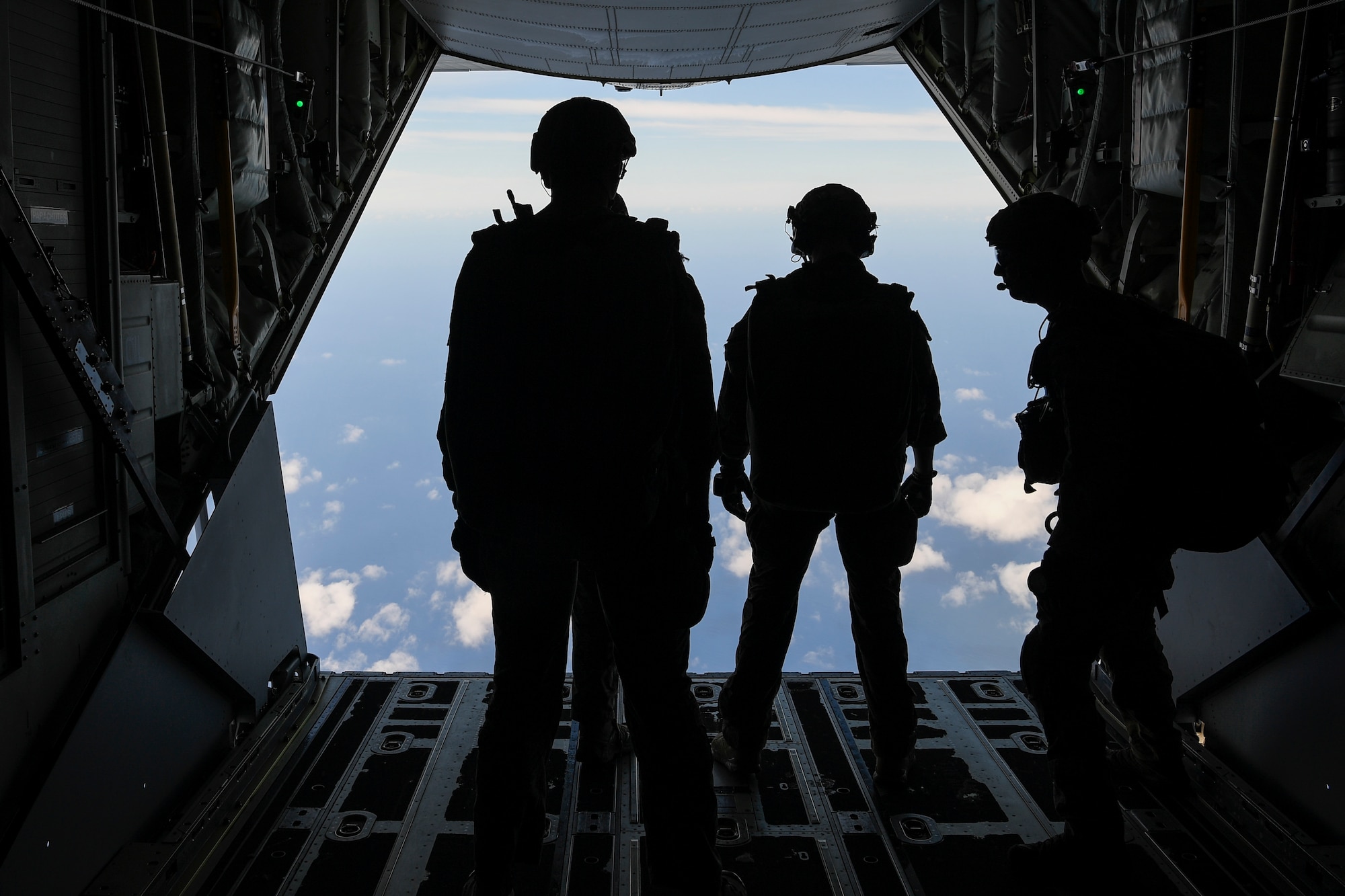 Special Tactics Airmen with the 320th Special Tactics Squadron prepare to jump from an MC-130J Commando II with the 17th Special Operations Squadron at Kwajalein Atoll, June 19, 2018.