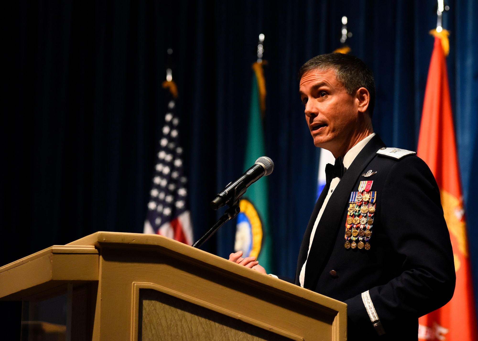 Brig. Gen. Paul Tibbets, Global Strike Command deputy commander, speaks in front of attendees at Fairchild's Air Force Ball at Northern Quest Resort and Casino in Airway Heights, Washington, Sept. 15, 2018. Tibbets served in a variety of operational assignments as a B-1B Lancer pilot as well as a B-2 Spirit pilot, recording more than 4,000 total flying hours. (U.S. Air Force photo/Airman 1st Class Lawrence Sena)