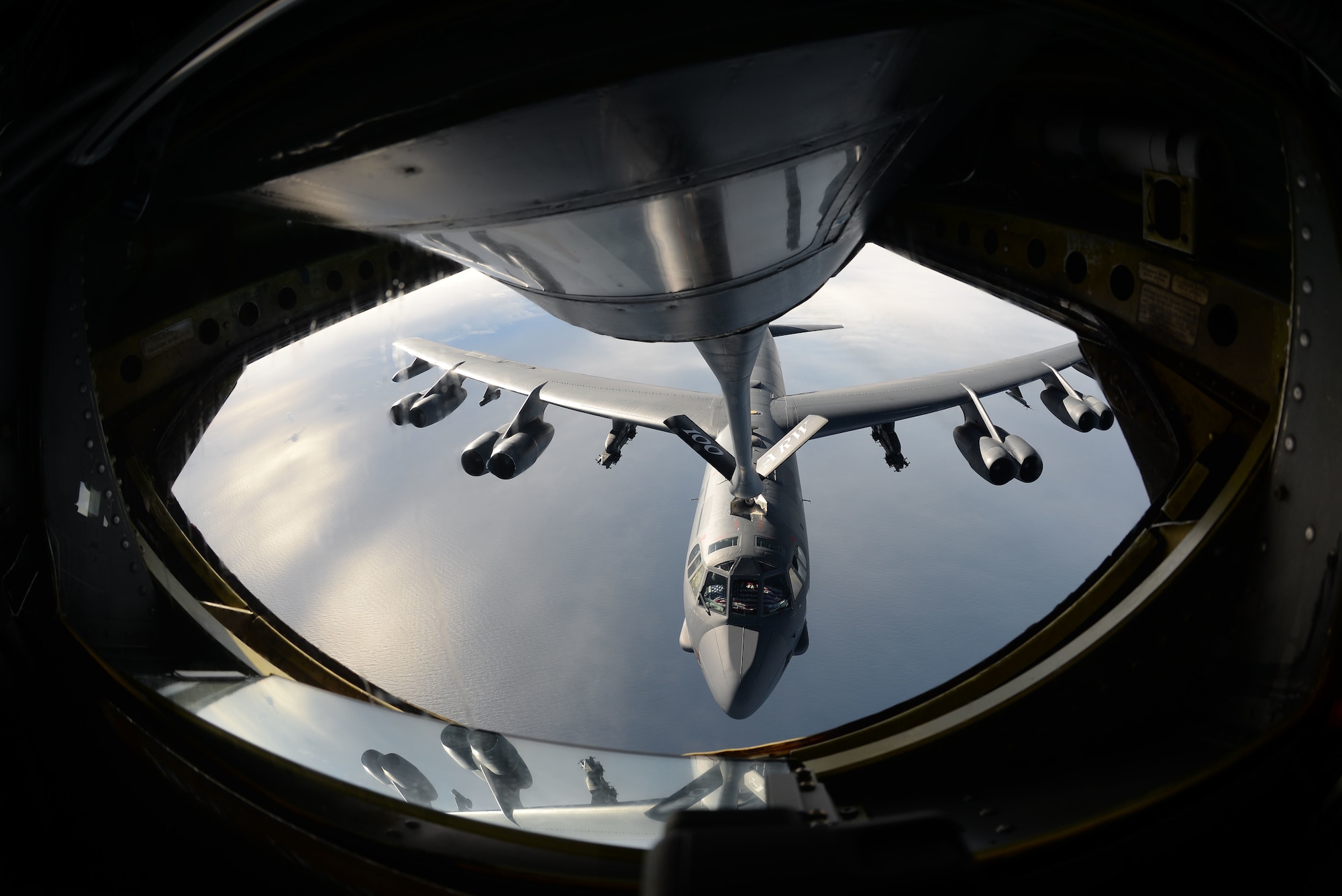 A U.S. Air Force B-52 Stratofortress receives fuel from a U.S. Air Force KC-135 Stratotanker during an air-refueling mission off the coast of Norway, Sept. 15, 2018. The purpose of the flight was to conduct theater familiarization for aircrew members and to demonstrate U.S. commitment to allies and partners through the global employment of our military forces. (U.S. Air Force photo by Senior Airman Luke Milano)