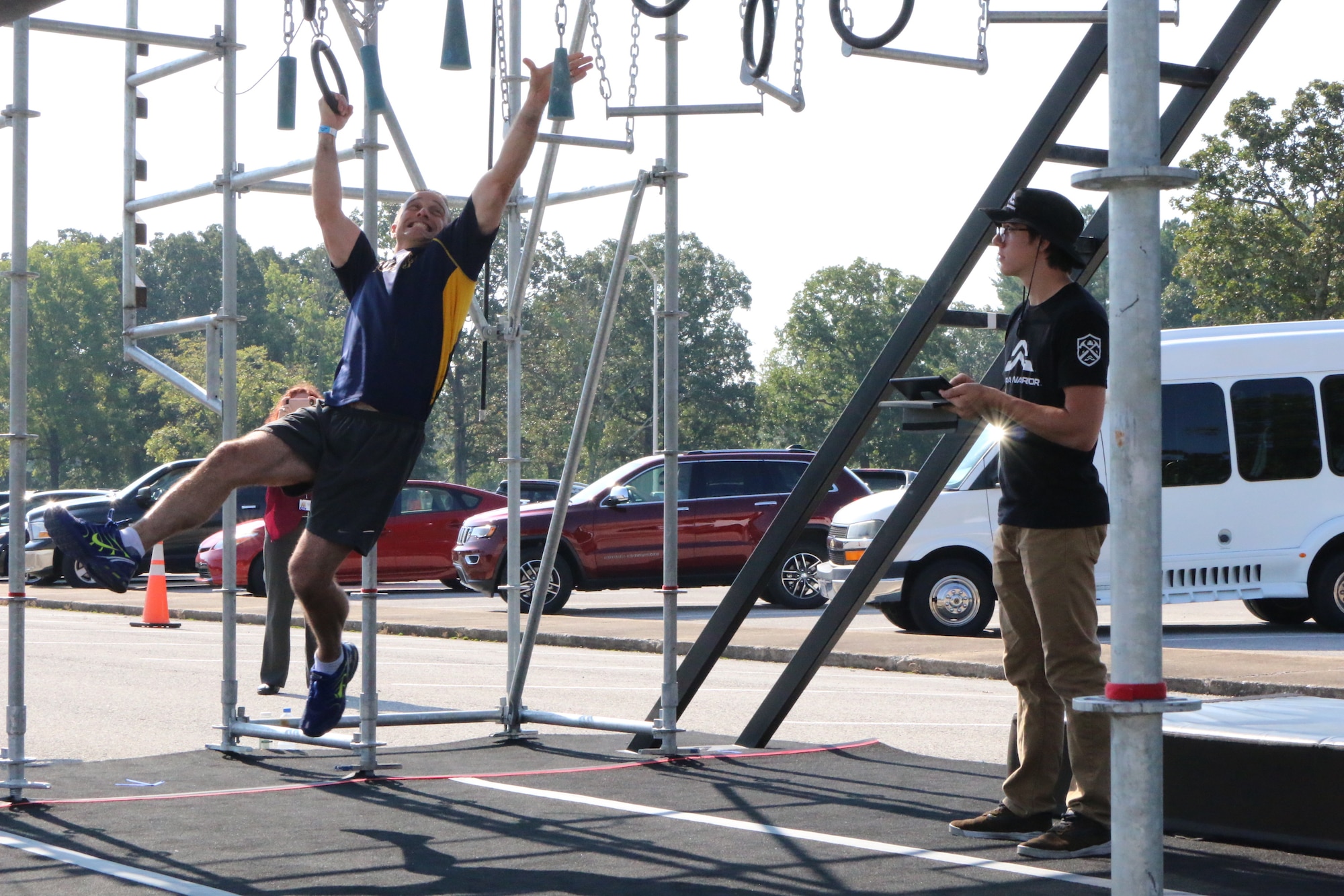Brian Allen reaches for the next grip during the Alpha Warrior Battle Rig competition Aug. 28 at Arnold Air Force Base. The rig and members of the Alpha Warrior team were at Arnold as part of an ongoing tour of Air Force bases across the world. (U.S. Air Force photo by Brad Hicks)