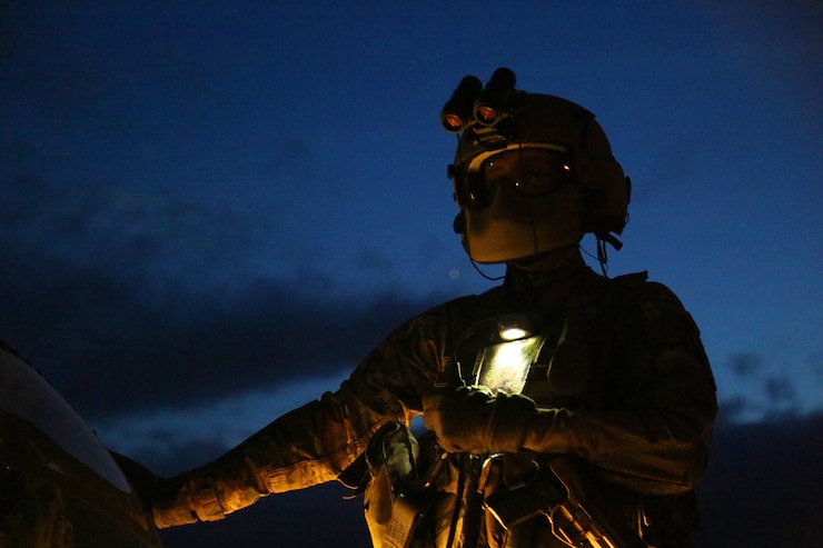 U.S. Army Spc. Michael Pitman, attached to 2nd Battalion, 227th Aviation Regiment, TF Lobos, 1st Air Cavalry Brigade (ACB), waits for the next pre-flight check, Hohenfels, Germany, April 30, 2018.