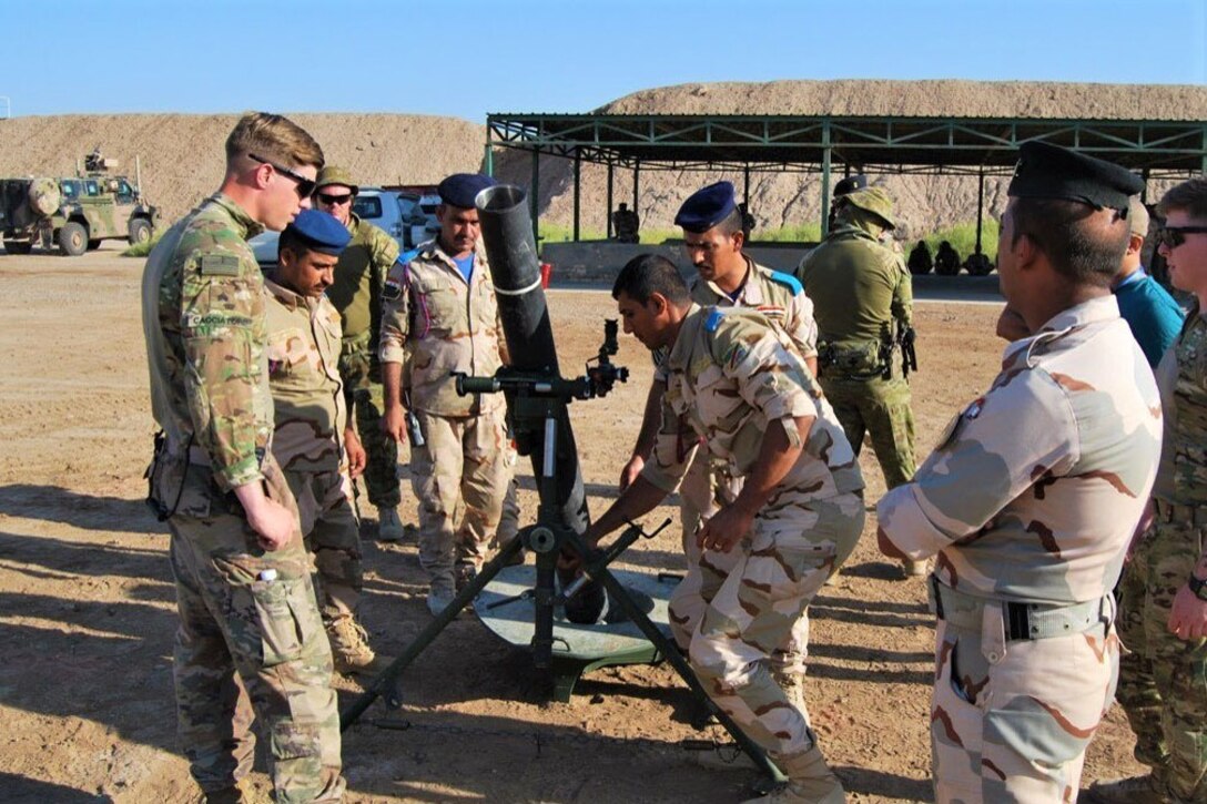 U.S. and Australian troops train members of the Iraqi Security Forces on a new  mortar system.