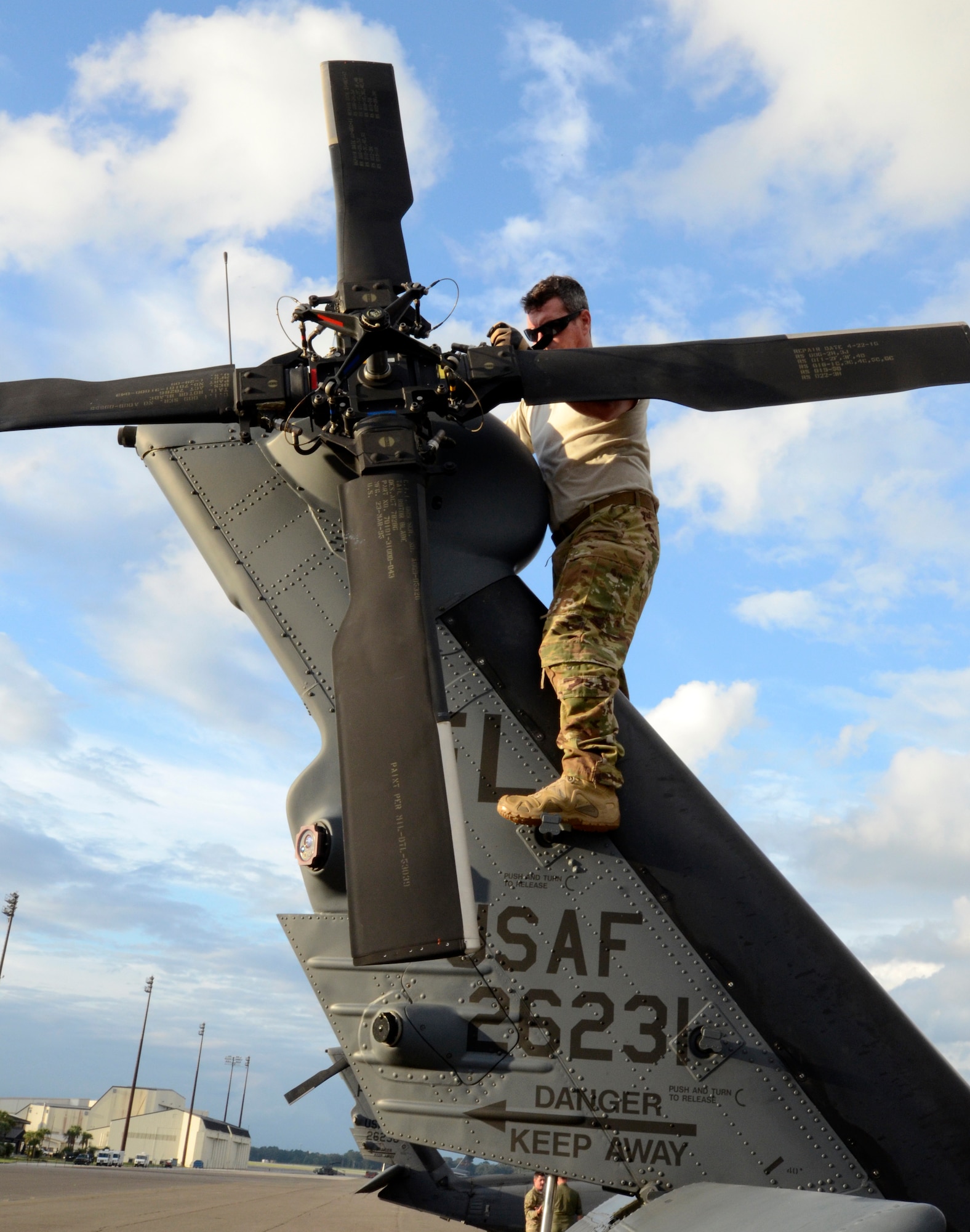 Senior Master Sgt. Will Towers, 301st Special Missions Aviator, checks the tail rotor blades as part of his preflight checklist at Joint Base Charleston, S.C., Sept. 16, 2018. Towers is part of the 334th Air Expeditionary Group, a unit comprised of 920th Rescue Wing and 23d Wing assets and Airmen which stands ready to provide search-and-rescue relief in the wake of Hurricane Florence. (U.S. Air Force photo/Tech. Sgt. Kelly Goonan)