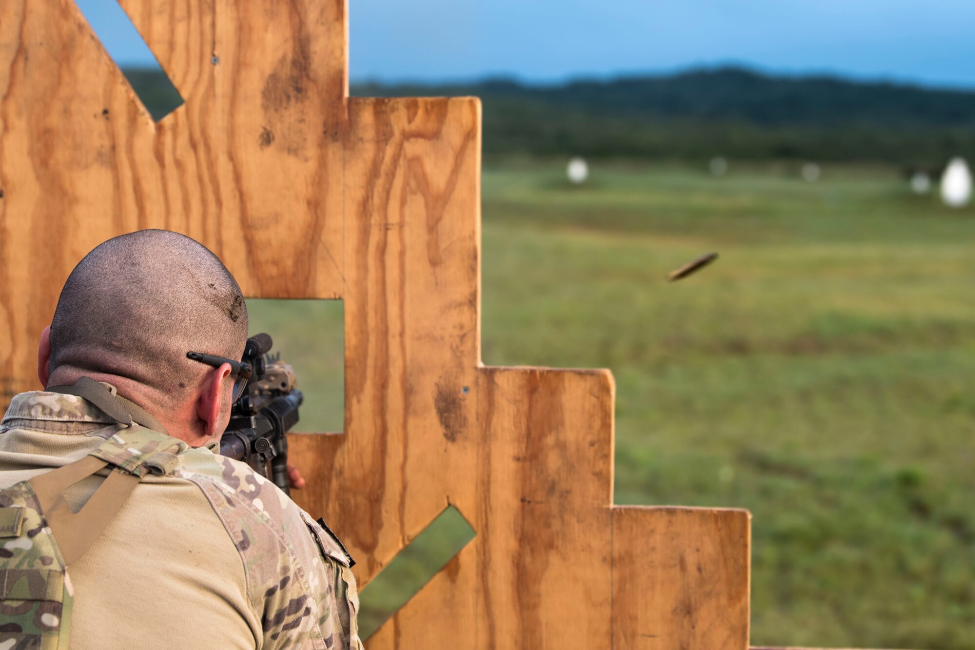 Tech. Sgt. Matthew Heiser, 49th Security Forces Squadron flight sergeant, fires an M4 carbine during the 2018 Defender Challenge, Sept. 12, at Joint Base San Antonio-Camp Bullis, Texas. Teams representing all twelve Air Force major commands, the Royal Air Force Regiment and German Air Force participated in the friendly competition, which tested their capabilities in dismounted operations, combat endurance and weapons tactics. The Air Combat Command team won second place in the overall competition, combat endurance and weapons challenge. (U.S. Air Force photo by Airman Taryn Butler)