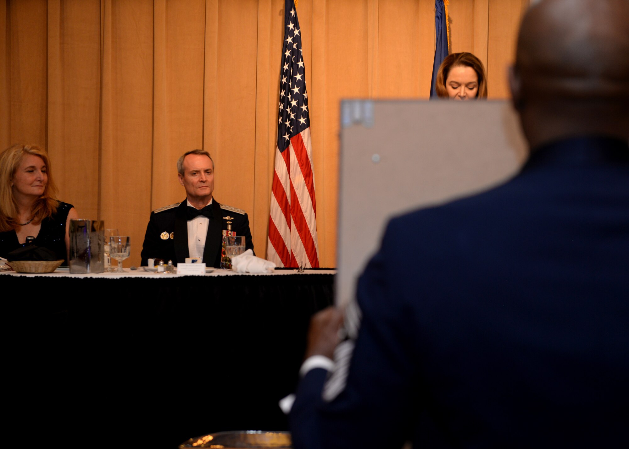 A scroll is presented to retired Lt. Gen. Darryl Roberson during an Order of the Sword ceremony at Luke Air Force Base, Ariz., Sept. 13, 2018.