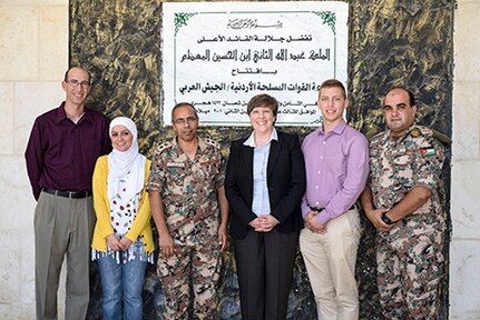 ​Colorado National Guard Public Affairs and Jordan Armed Forces Directorate of Moral Guidance pose outside the JAF-Arab Army Radio Station in Amman, Jordan, Aug. 9, during an annual National Guard State Partnership Program public affairs exchange. Jordan Armed Forces-Arab Army radio embodies Jordan's anti-extremist values.