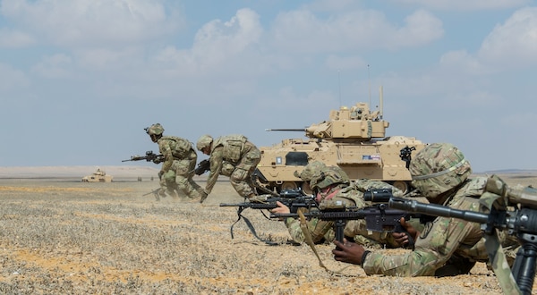 U.S Army Soldiers assigned to Company A, 1st  Battalion, 155th Infantry Regiment, 155th Armored Brigade Combat Team, Task Force Spartan, bound toward an objective during a rehearsal for a combined live-fire exercise near Alexandria, Egypt, Sept. 10, 2018.  The 155th ABCT is in the Arab Republic of Egypt taking part in Exercise Bright Star 18, a multilateral U.S. Central Command training exercise. Bright Star 18 provides an opportunity for U.S. Central Command to pursue better ways to address specific threats to regional security at the tactical, operational, and strategic levels with their Egyptian and other regional partners. (U.S. Army photo by Sgt. James Lefty Larimer)