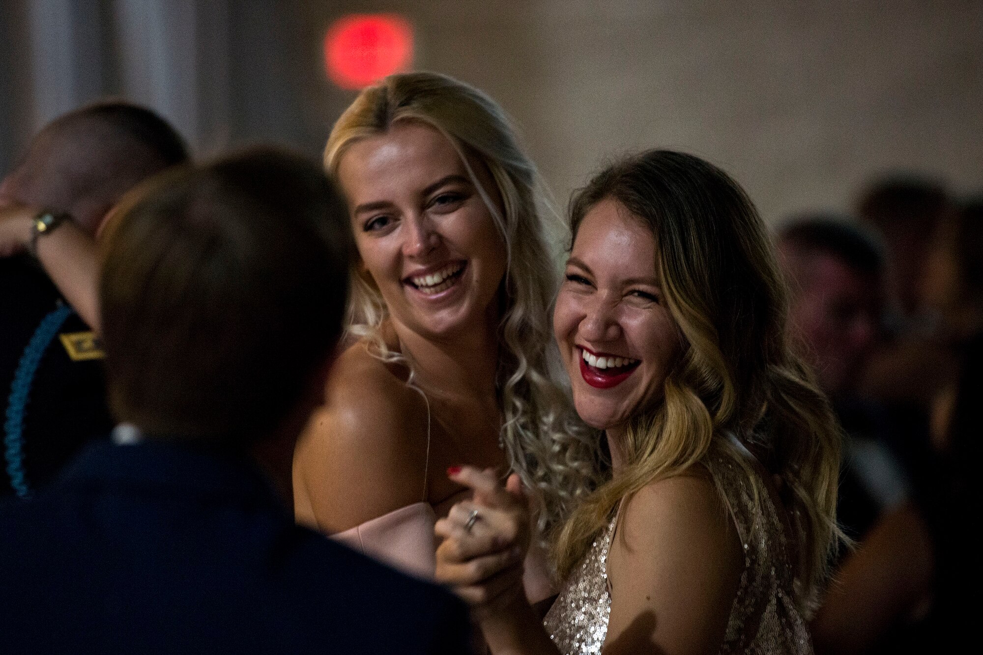 Attendees share a laugh during the Air Force Ball, Sept. 15, 2018, at the James H. Rainwater Conference Center in Valdosta, Ga. Moody’s Air Force Ball was not only a celebration of the Air Force’s 71st Birthday but a way to foster esprit de corps and pride among Airmen through a shared history of exceptional service. (U.S. Air Force photo by Airman 1st Class Erick Requadt)