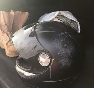 Helmet from a Colorado Army National Guardsmens motorcycle crash in 2015. The rider survived.