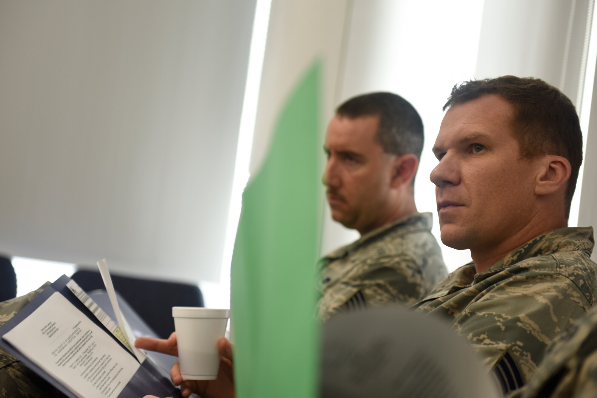 U.S. Air Force air transportation specialists with the 145th Logistics Readiness Squadron (LRS), listen as Senior Master Sgt. Gene Katz, operations and compliance superintendent with the 145th LRS, briefs personnel assigned to an 11-person team ready to assist in Hurricane Florence Relief efforts at the North Carolina (N.C.) Air National Guard Base, Charlotte Douglas International Airport, Sept.17, 2018.  The 11-person team will create and move pallets filled with supplies like food and water in a Kinston, N.C. airport.