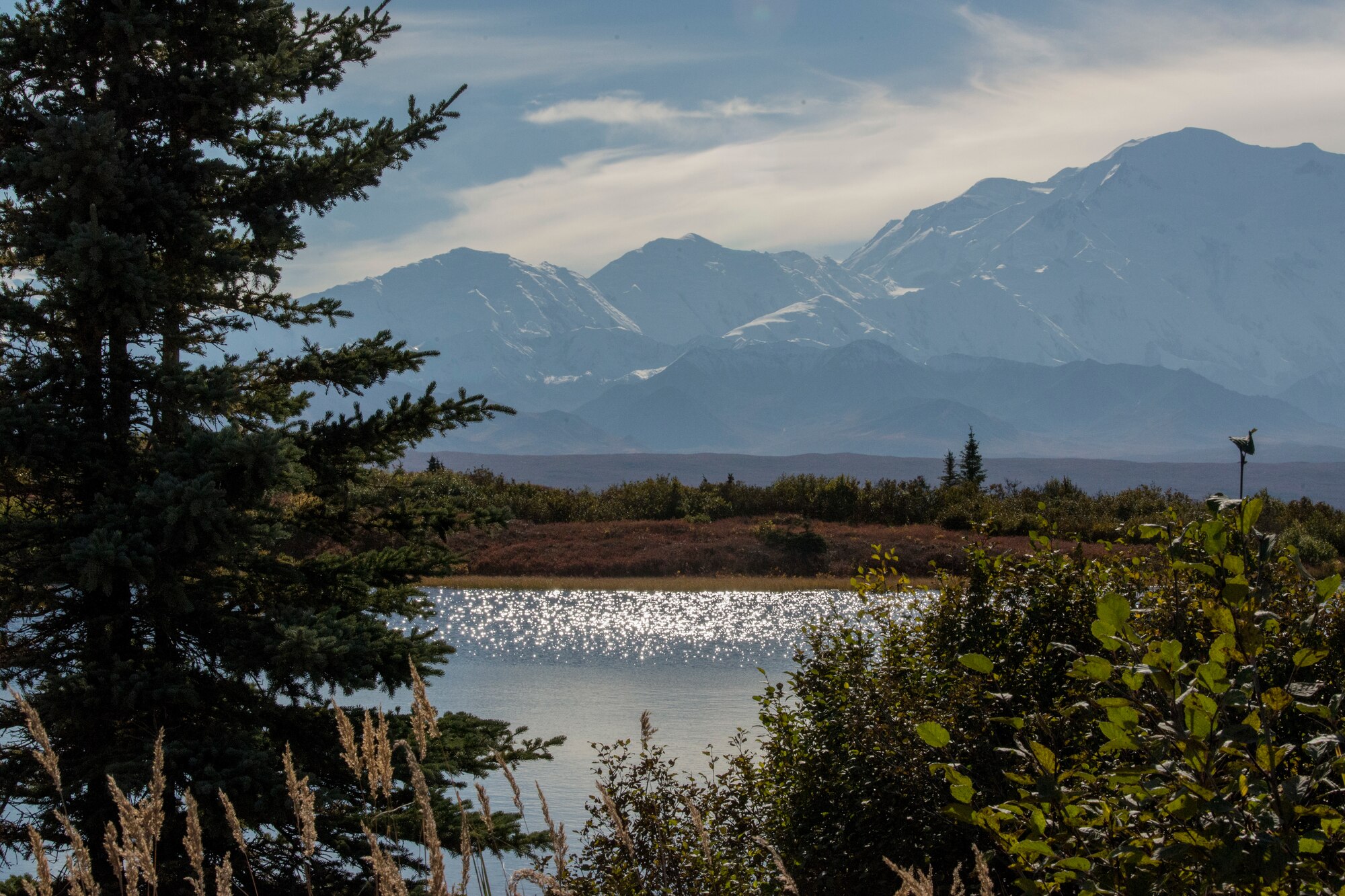 Denali is visible to visitors at Reflection Pond during Military Appreciation Day at Mile 85.3 in Denali National Park and Preserve, Alaska, Sept. 15, 2018. The 11th annual Military Appreciation Day included 400 “road lottery” tickets given out to Alaska-based service members. With the warm, dry weather conditions this year, road lottery recipients were given the chance to drive out to the end of the park road at Mile 92.